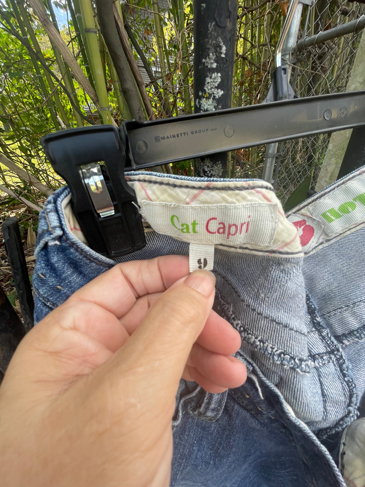 Distressed denim jeans, ankle length jeans, reloved clothing denim