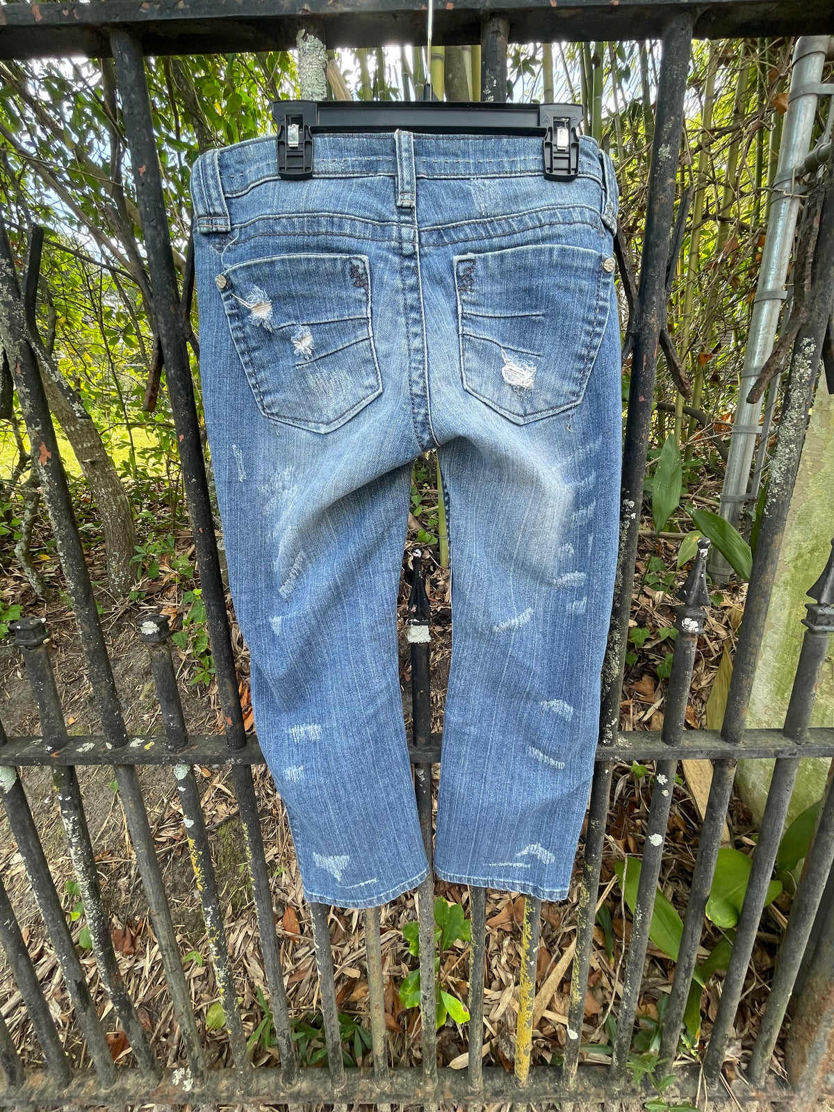 Distressed denim jeans, ankle length jeans, reloved clothing denim